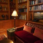 Cozy Reading Nook Decor with Exposed Bulb Wall Sconces